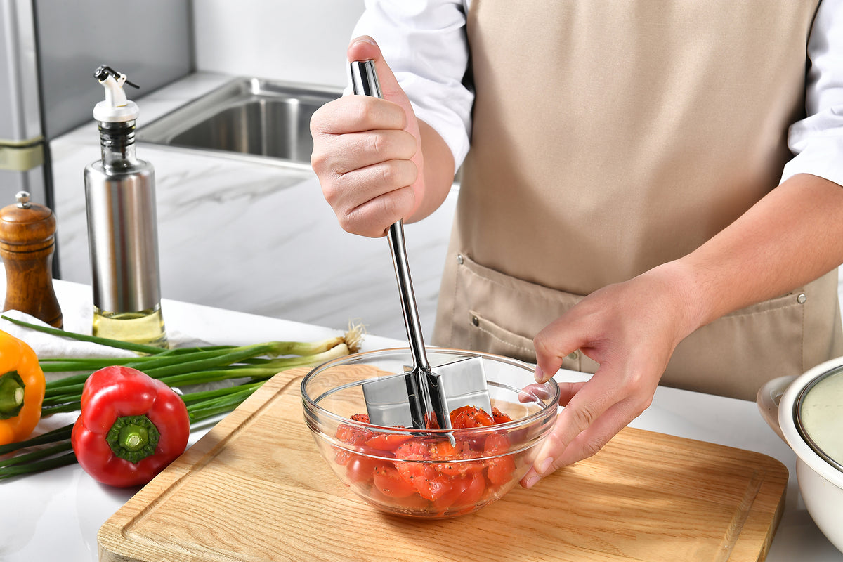 Gerior stainless steel meat chopper chopping in a pot of canned or fresh potato